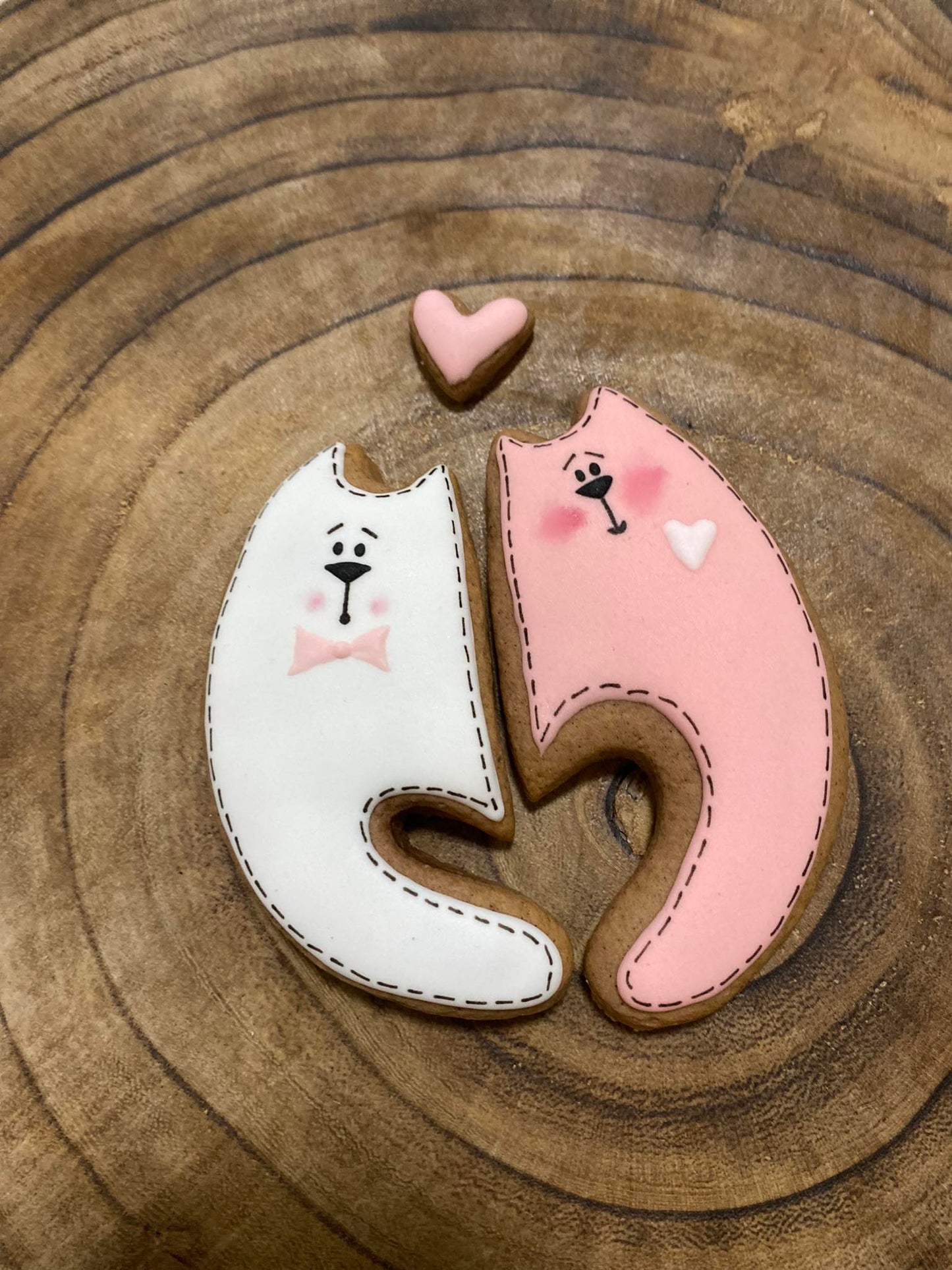 Cutter Cats with hearts made of tails